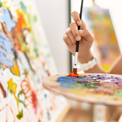 Kids painting on canvas during a school holiday workshop at Marnong Estate