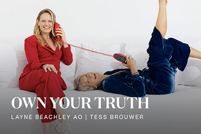 Layne Beachley & Tess Brouwer on a white sofa