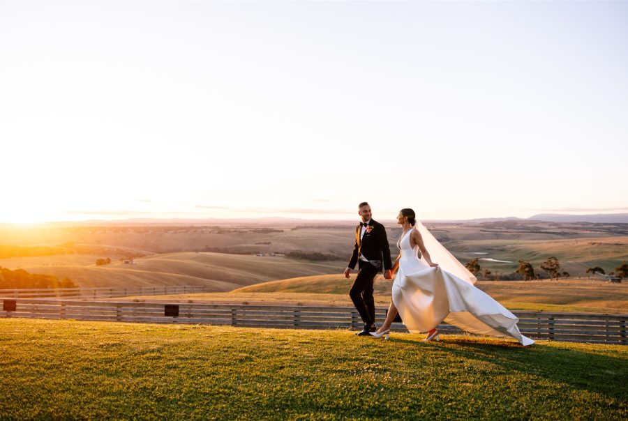a newly wedded couple at the sunrise