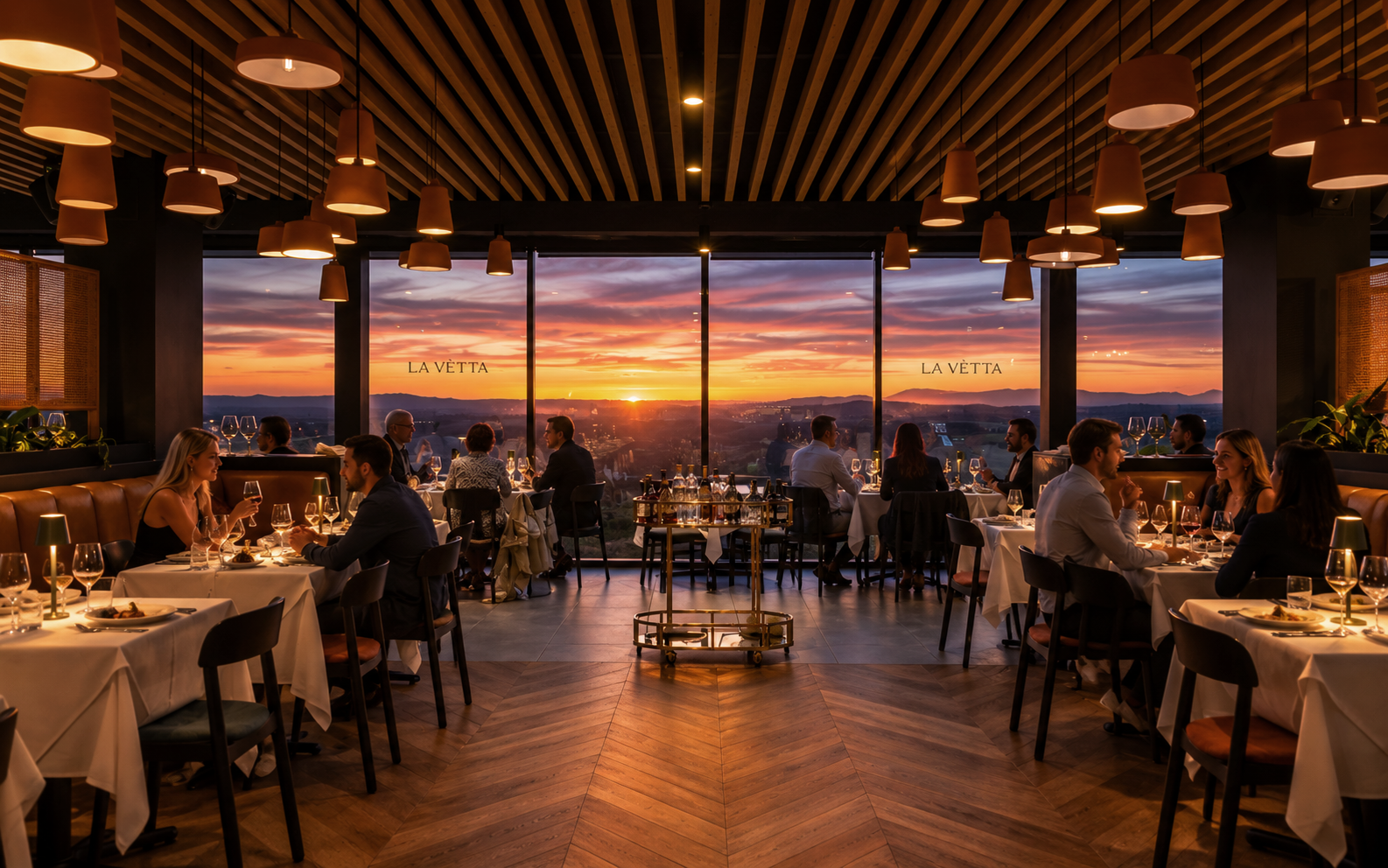 The La Vètta dining room at sunset, with diners facing the windows